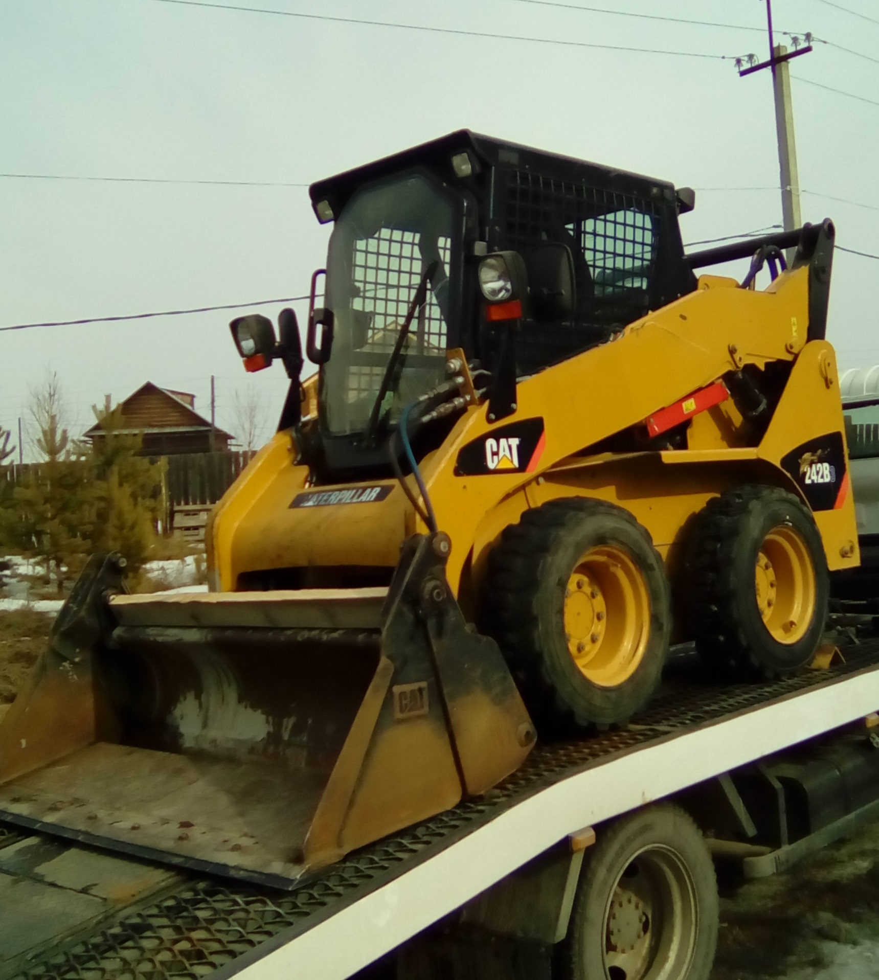 Погрузчик иркутск. Объем ковша Бобкэт. Caterpillar Иркутск. Картинка Мустанг 2700v каретки ковша.