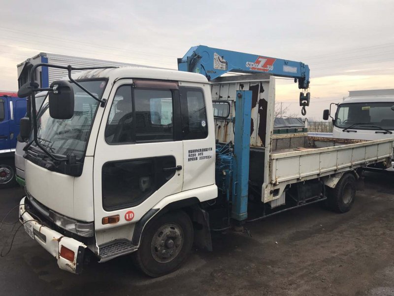 Воровайка приехала. Ниссан дизель mk210. Nissan Diesel 1997 воровайка. Nissan Diesel 1993. Nissan Diesel манипулятор 5т.