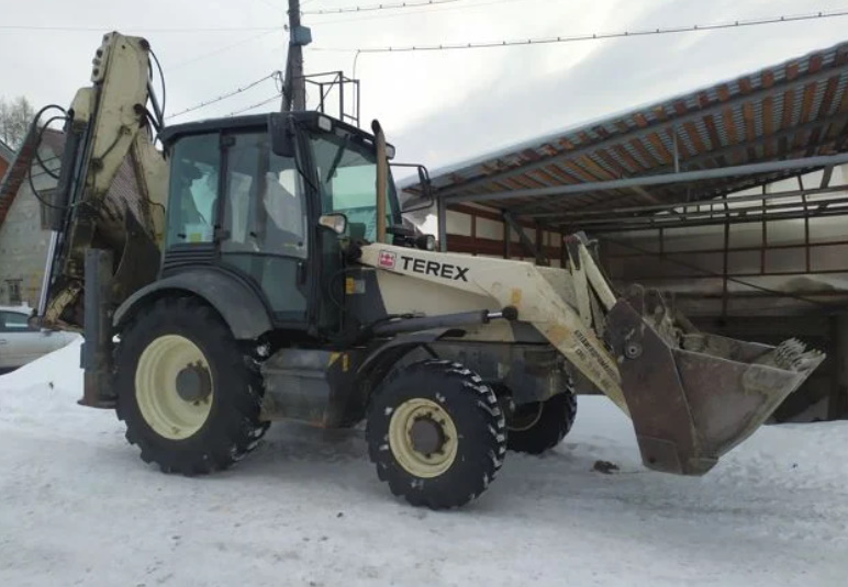 Работа барнаул погрузчик. Экскаватор-погрузчик Terex 970 Elite. Экскаватор Терех 970. Трактор Терекс 970. Погрузчик Терех 970 Элит.