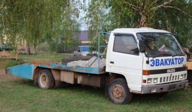 Объявление от Алексей: «Эвакуатор isuzu ELF 1996» 1 фото