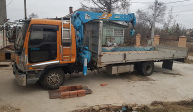 Объявление от Дмитрий: «Заказ манипулятора- крана. Перевозка грузов. isuzu» 2 фото