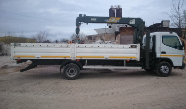 Объявление от ЕВРОТРАНСБЕТОН: «Манипулятор в аренду. Перевозка грузов на манипуля manipulyatory-3-tonn» 2 фото
