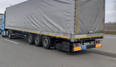 Объявление от Андрей: «Полуприцеп грузовой с тентом koegel» 2 фото