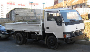Грузоперевозки на бортовом грузовике в Магадане