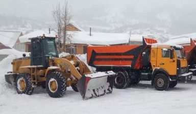 Уборка снега тракторами ВОЛЬВО и МТЗ-82