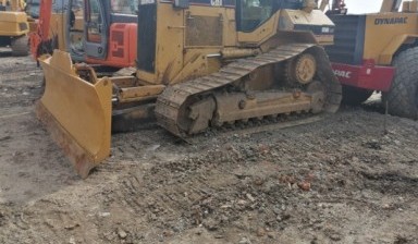 Объявление от Sunbelt Rentals: «Uprooting stumps with a bulldozer» 1 photos