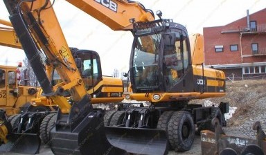 Объявление от Спецтехдорстрой: «Аренда колесного экскаватора JCB JS 200W» 1 фото