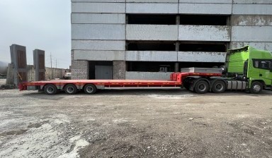 Объявление от СтройИнвест: «Перевозка низкорамным тралом 50 тонн. man» 1 фото