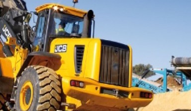 Аренда колесного погрузчика от Спецтехника: JCB 1 фото