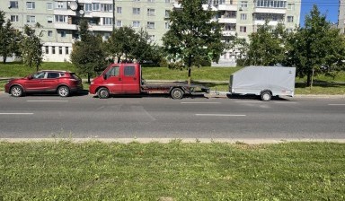 Объявление от Автоарендадрайв: «Перевозка 2-х авто тентованным прицепом, открытой» 4 фото
