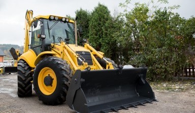 Объявление от Янковский и партнеры: «Аренда экскаватора- погрузчика  New Holland b80b» 1 фото