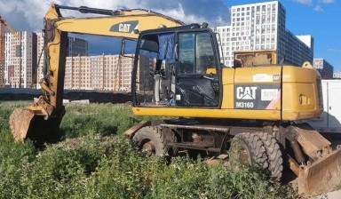 Объявление от Мустафин Алибек Оркенович: «Услуги колесного экскаватора CAT M316D» 1 фото