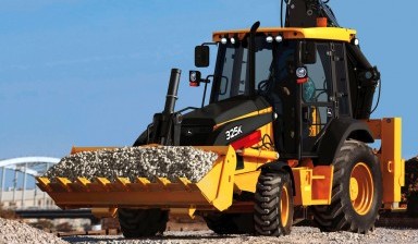 Объявление от Русанов А С: «Услуги экскаватора погрузчика John Deere 325K» 1 фото