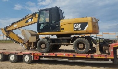 Экскаваторы от ТехИнвест: Caterpillar M318D 4 фото