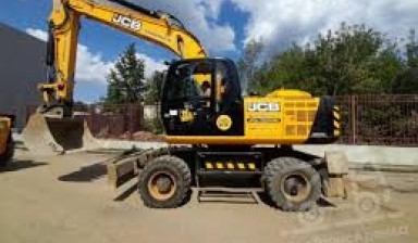 Аренда экскаватора с грейдерным отвалом от Смит: Komatsu 1 фото