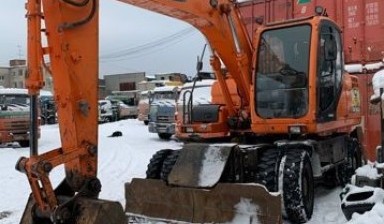 Аренда автомобильного экскаватора от МУН-ГРУПП: Doosan 1 фото