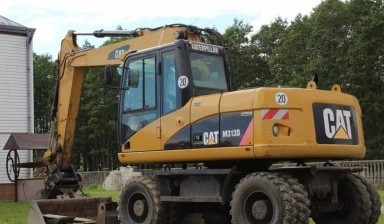 Аренда полноповоротного экскаватора от Аренда спецтехники: Caterpillar 1 фото