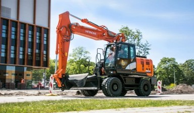 Аренда экскаватора со смесительным ковшом от ПрофТранс: Hitachi 1 фото