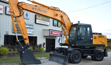 Аренда экскаватора с рыхлителем от Ekskavator24.ru: New Holland 1 фото