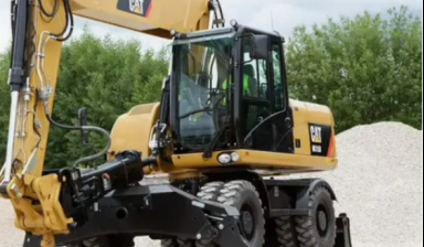 Аренда автомобильного экскаватора от «Партнер Строй»: Caterpillar 1 фото