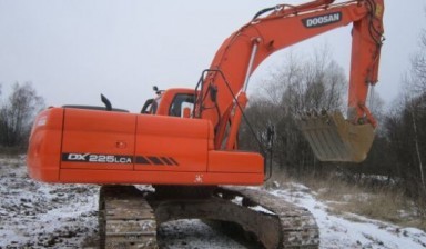 Аренда экскаватора с гидробуром от «ДЕМОНТАЖ-СТРОЙ»: Doosan 1 фото