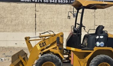 Frontend loaders and telescopic handlers от Manager: Caterpillar 1 photos