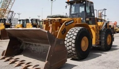 Frontend loaders and telescopic handlers от Manager: Caterpillar 1 photos