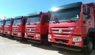 Самосвалы 19 кубовые от ИДНА: HOWO T5G 1 фото