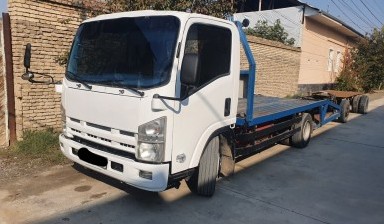 Эвакуаторы и автовозы от Машхур: Исузу 2 фото