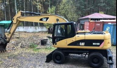 Услуги колесного {cat_name-chego} от ООО "СПЕЦ-ТЕХНИКС": Caterpillar M317D2 1 фото