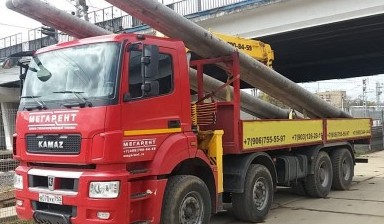 Объявление от МЕГАРЕНТ: «Аренда манипулятора 10 тн кузов, 7 тн стрела, 21м» 2 фото