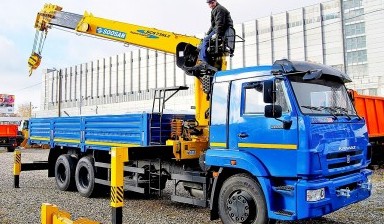 Объявление от МЕГАРЕНТ: «Аренда манипулятора 10 тн кузов, 10 тн стрела, 21м» 1 фото